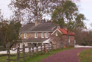 Features the restored house and barn, furnished with antiques, furniture, tools, and farm equipment.