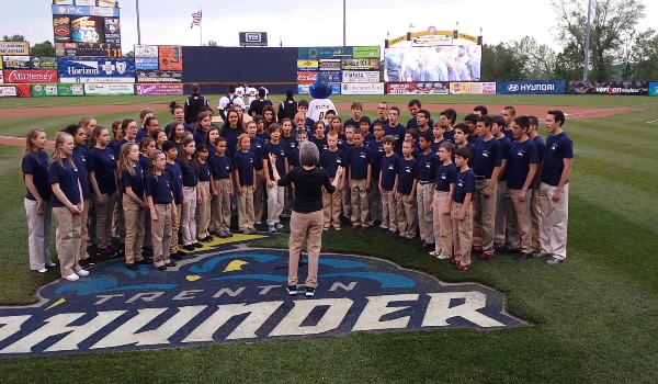 Chorus Performing National Anthem before game