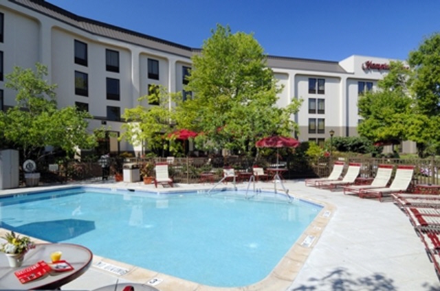 Outdoor Swimming Pool at the Hampton Inn is the best place to relax and chill on a hot summer day