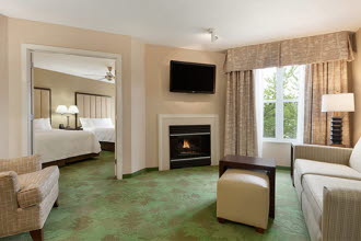 Homewood Suites by Hilton Harrisburg-West Hershey Area - 2 Queen 1 Bedroom Fireplace - 555x360.jpg
